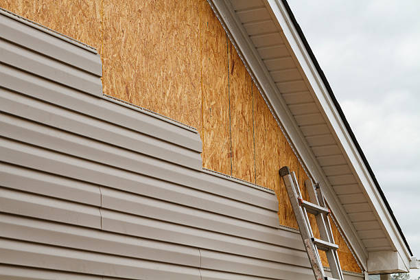 Professional Siding technician working in Lemont, PA